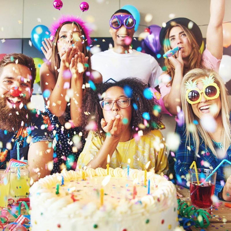 confetti-flying-around-group-celebrating-a-party.jpg